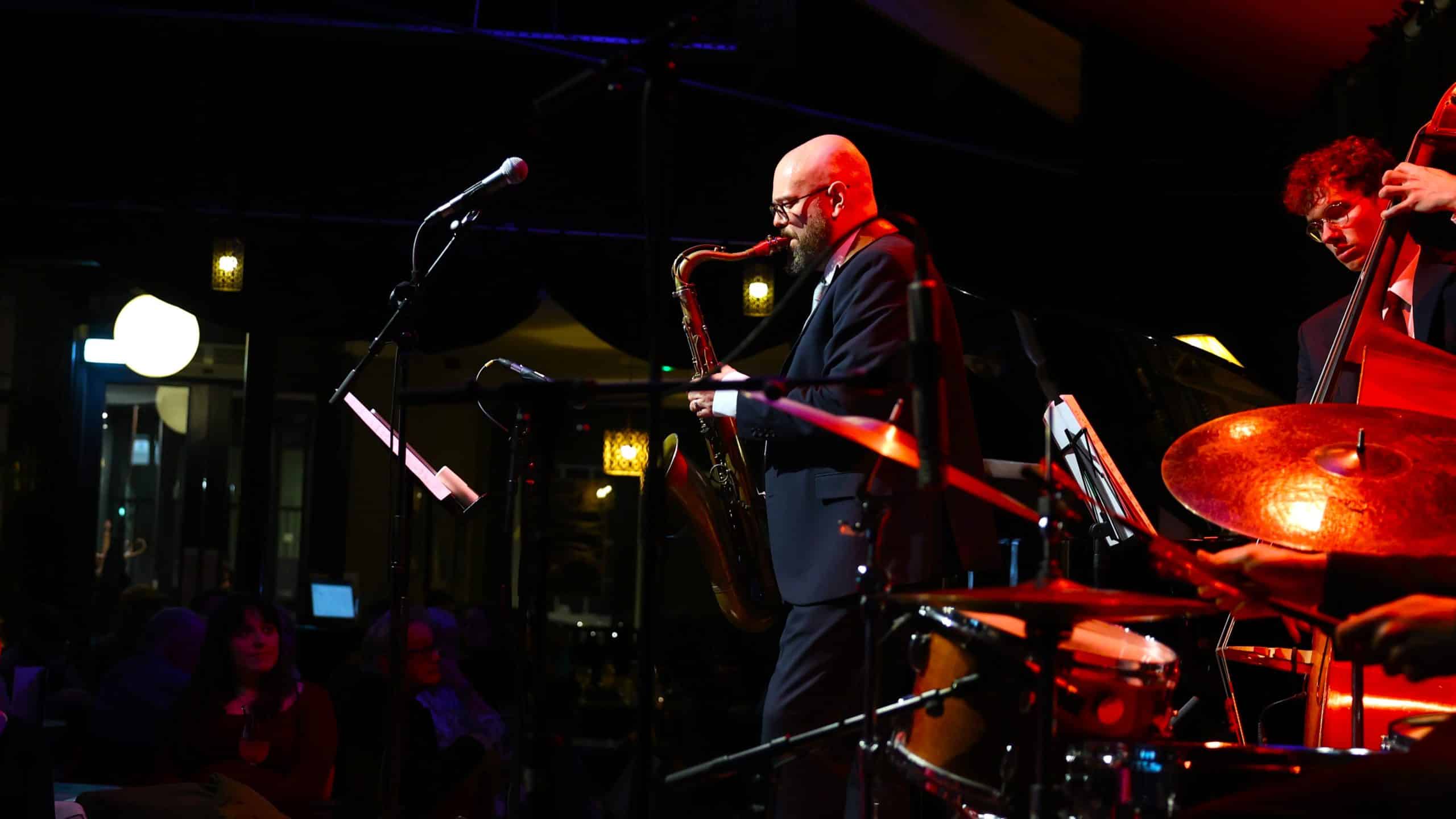 Dan Forshaw playing saxophone live with his quartet